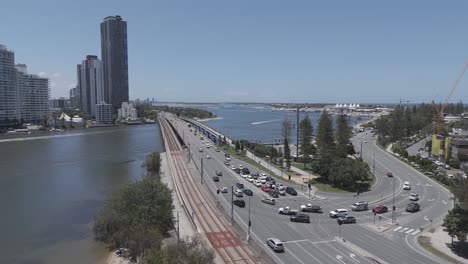 vehicles moving along a busy coastal highway