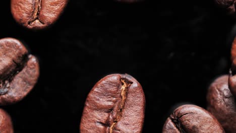 roasted coffee beans background. video loop. close-up