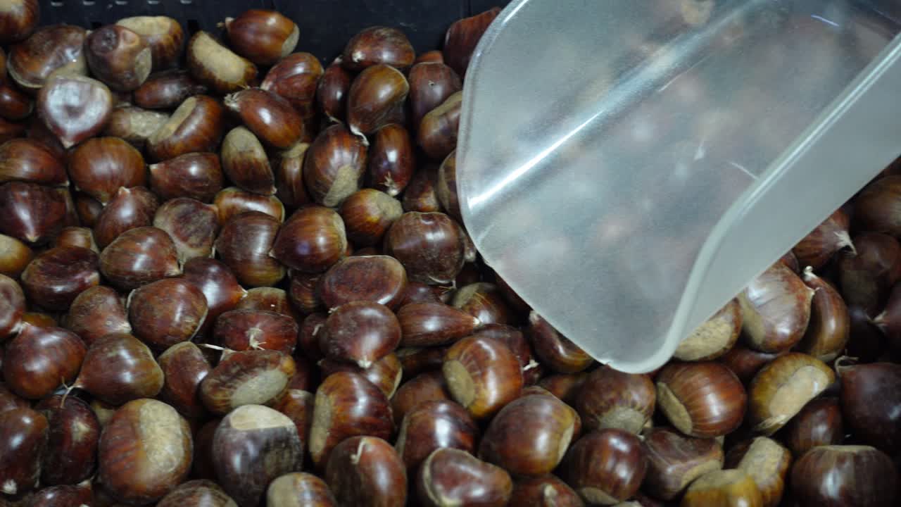 A basket with chestnuts in the market