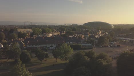 panning shot of if a dublin suburb in june with a drone