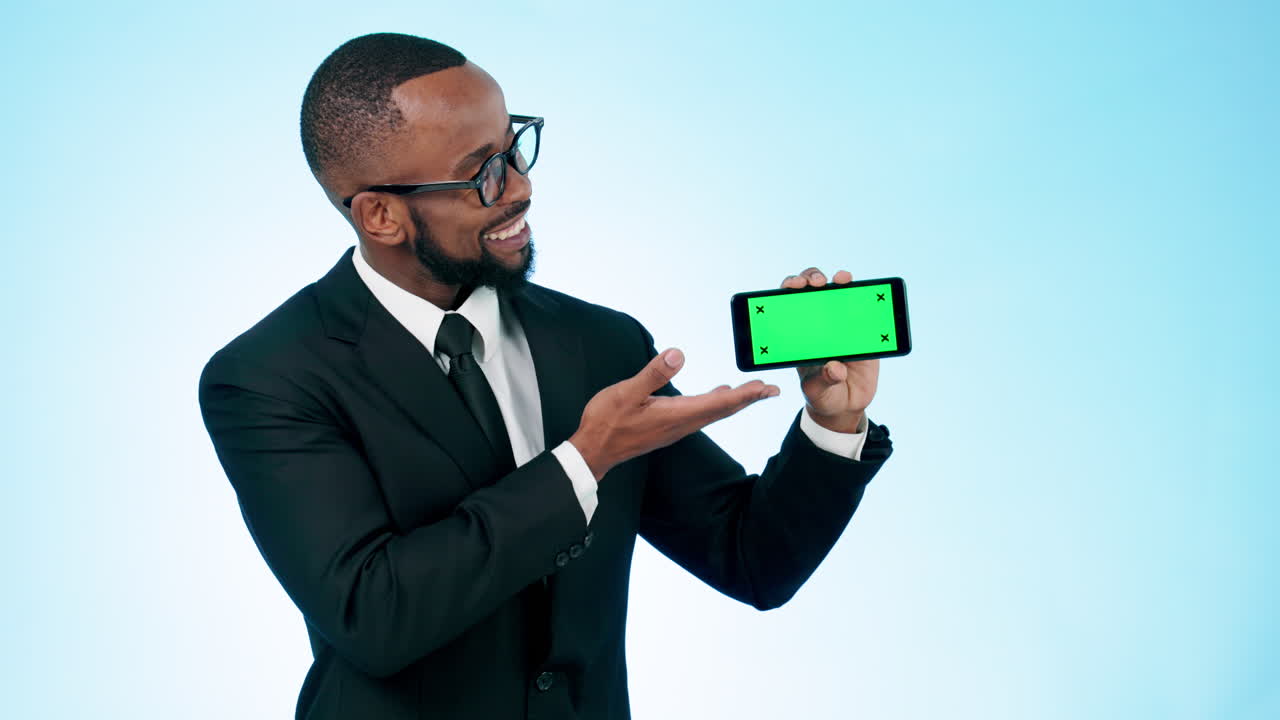 Happy businessman, phone and green screen