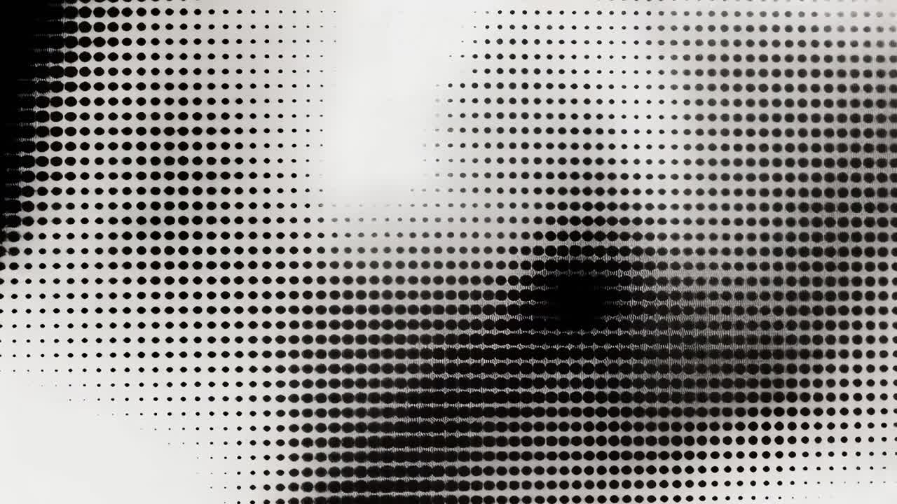 Abstract video art with a halftone effect, blending monochrome dots