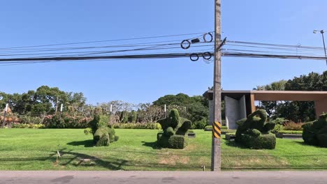 view from a vehicle passing a gated facility