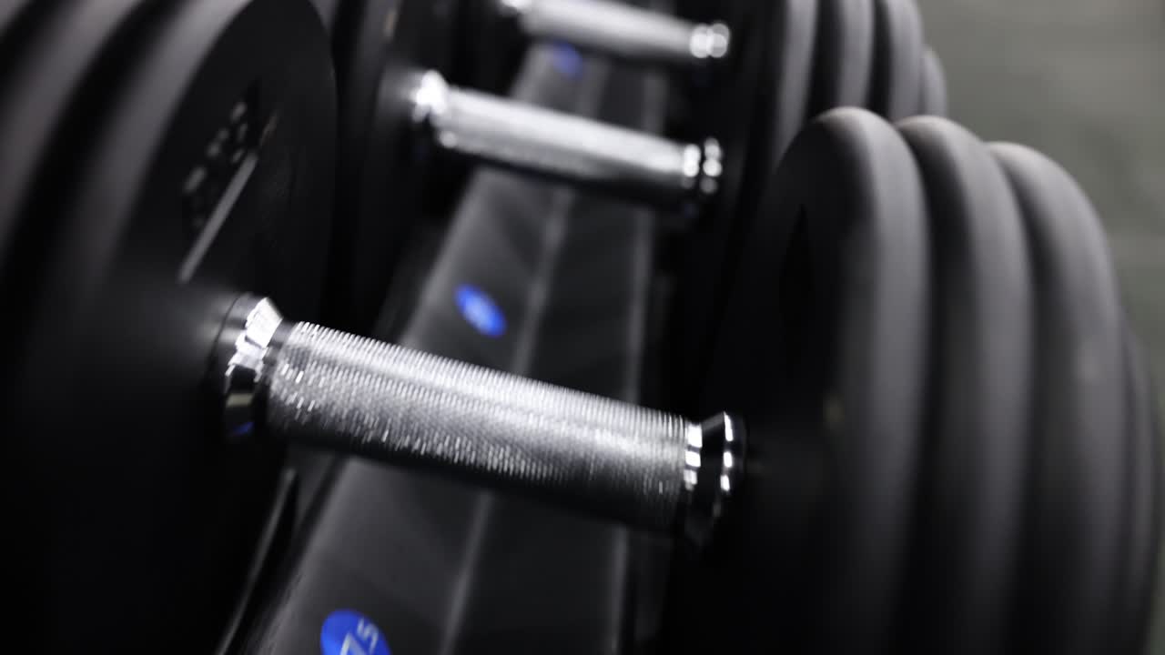 A rack of dumbbells in a gym