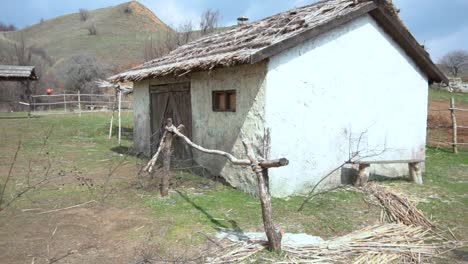 old village scene with well and houses