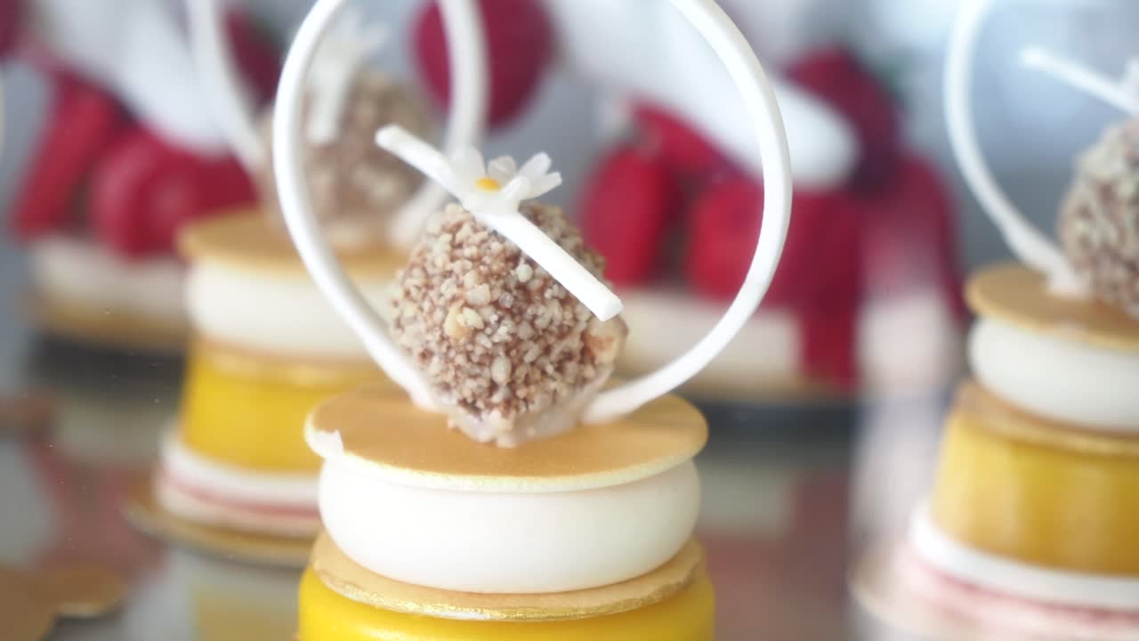Close-up of elegant individual dessert with nuts