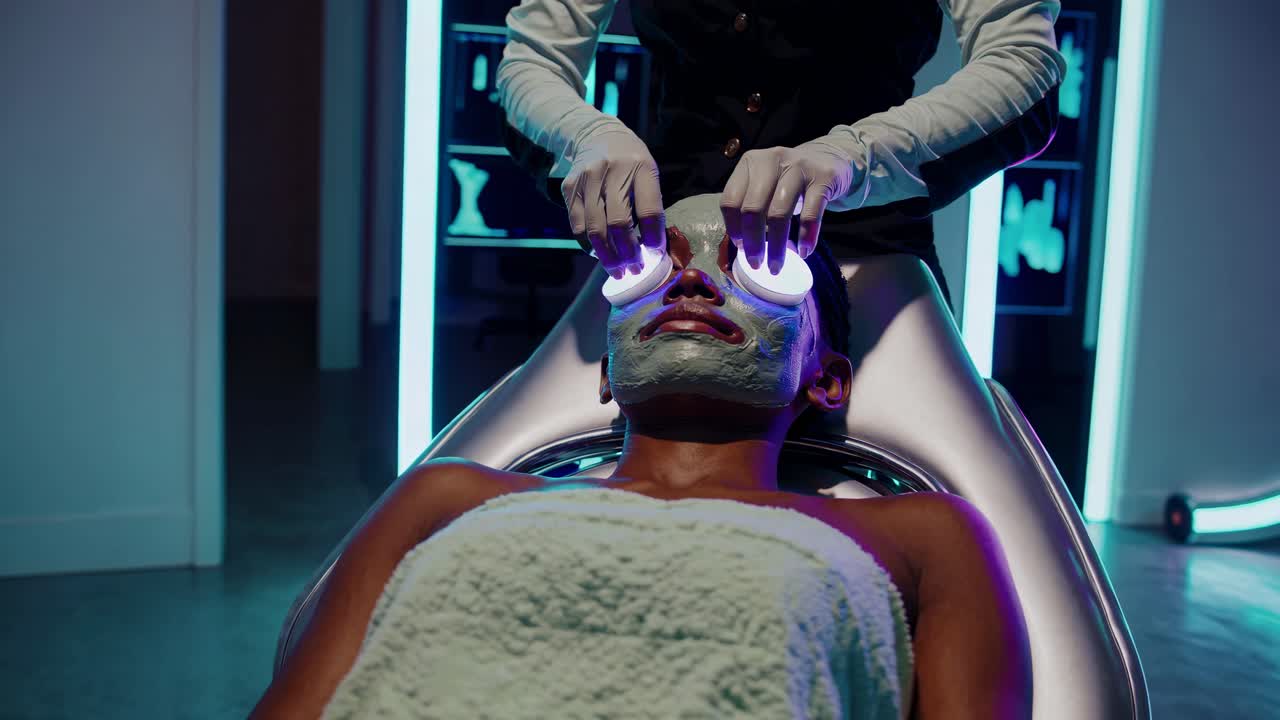 Woman Receiving Advanced Facial Treatment in a Modern Spa