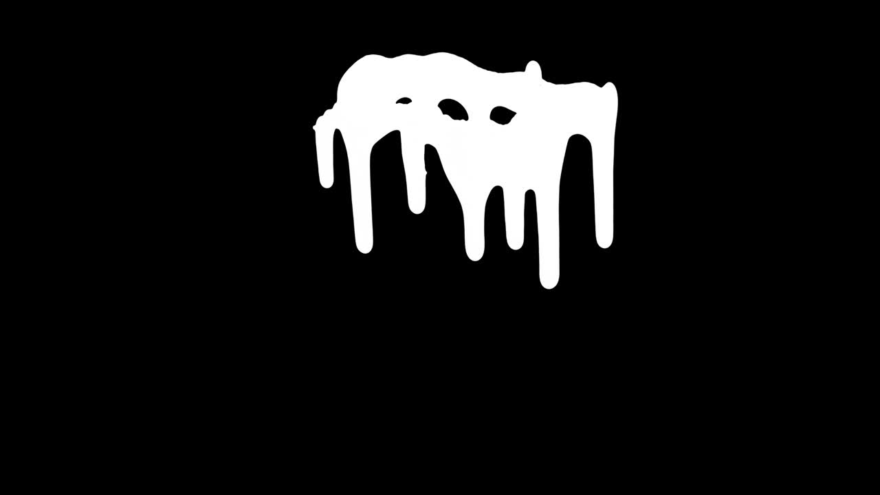 tinta blanca goteando sobre el fondo negro de la pantalla