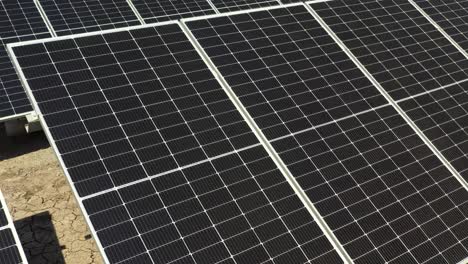 aerial close up view solar batteries. large economical photovoltic panel producing clean energy from sun.4k video