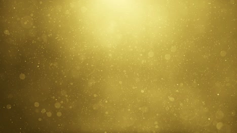 Golden-defocused-background-with-floating-particles---bubbles-flowing-in-the-yellow-light---Soft-Glittering-Background