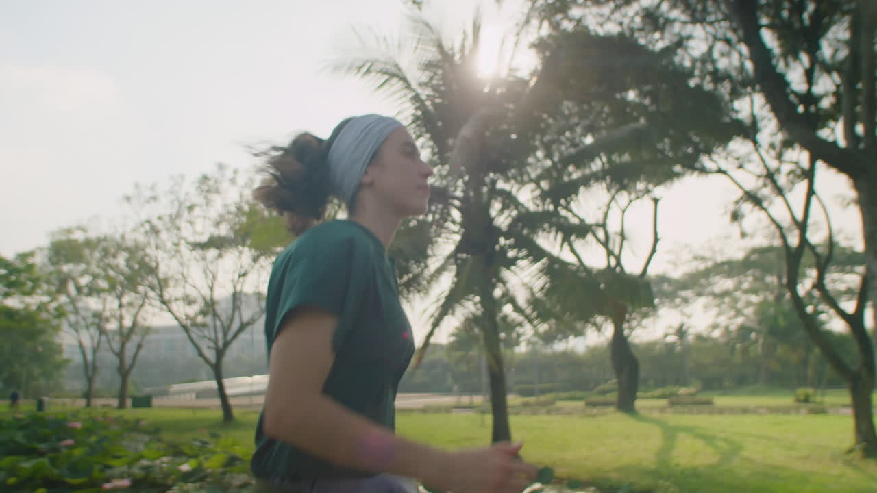 Active Woman Jogging in Morning in Park