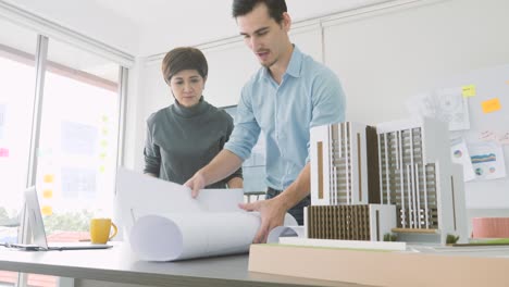 team of creative architects working together in a architect studio