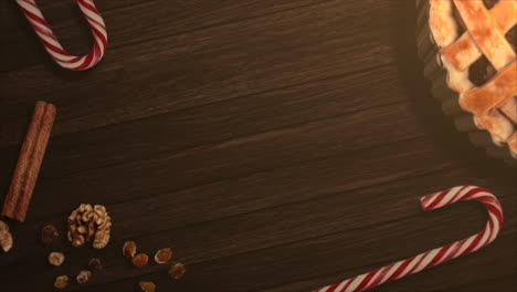 caramelo de primer plano animado y pastel de navidad sobre fondo de madera 1