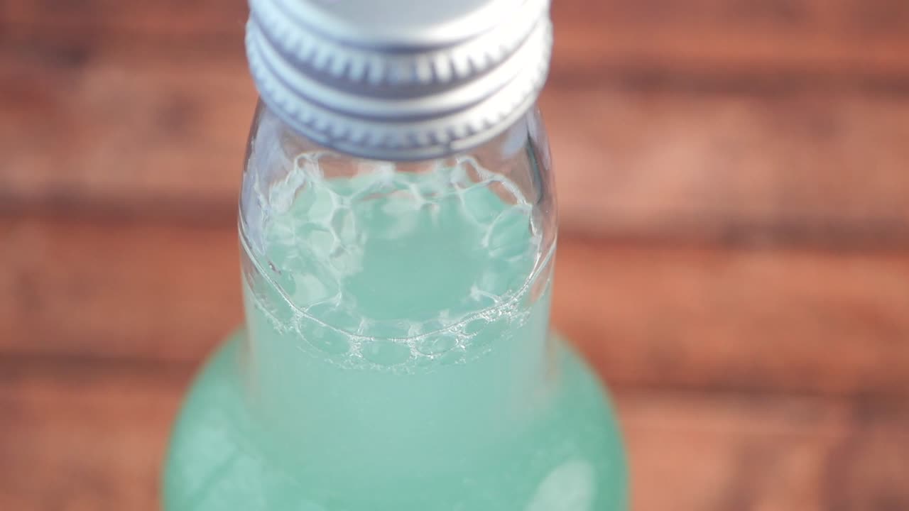 Close-up of a Bottle of Soda