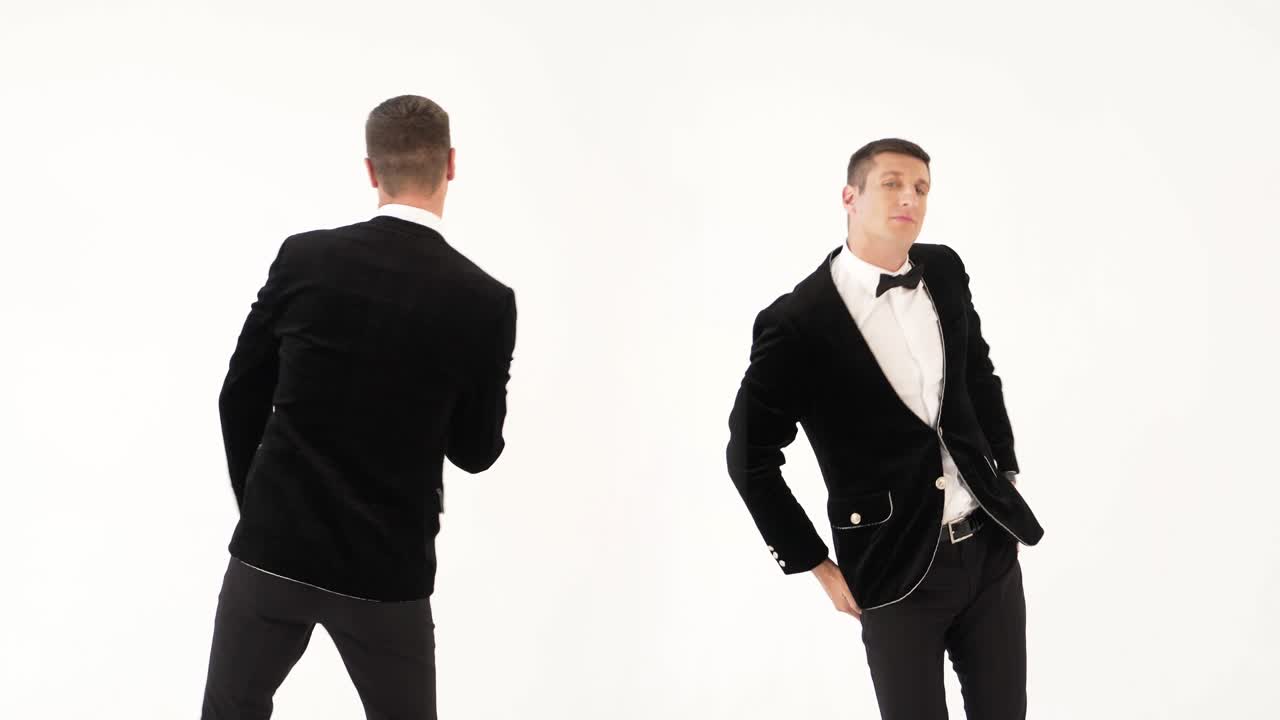 2K compilation (montage) two fun men in black suits are dancering as dancers on a white background in the studio. Parody of the dancers