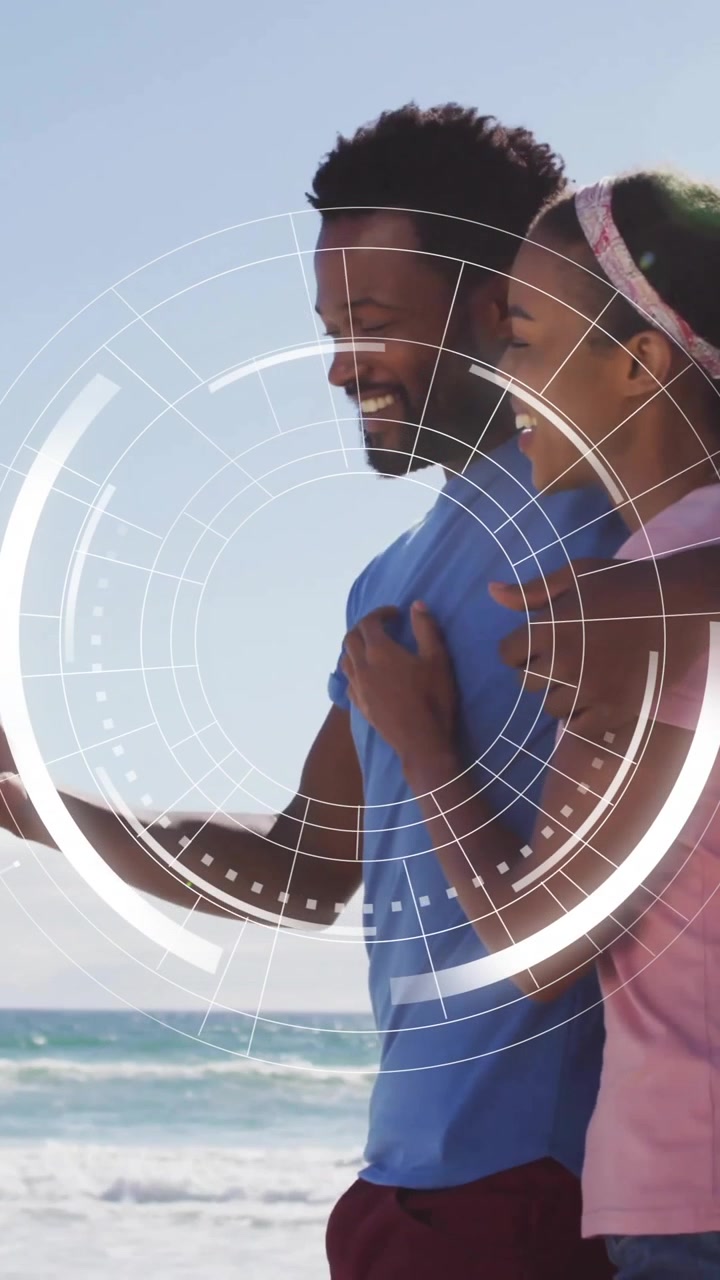 Couple on beach with smartphone, digital interface animation over them