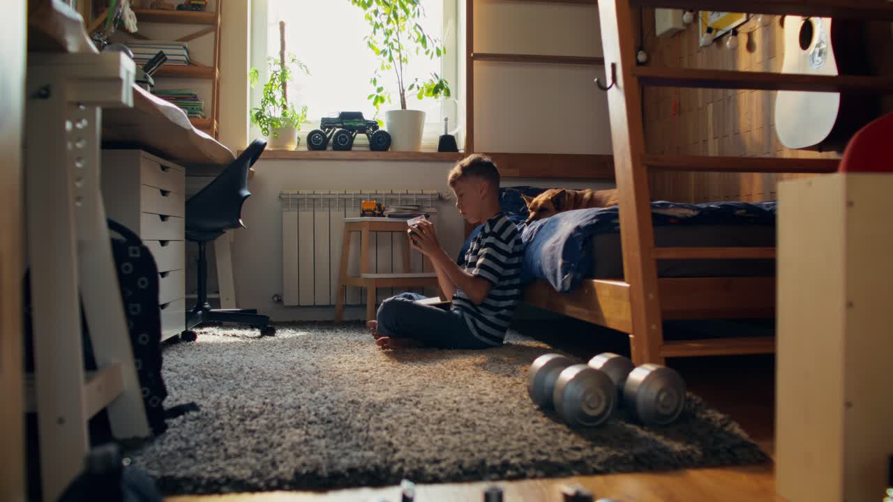 Boy playing puzzle in his bedroom