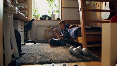 boy playing puzzle in his bedroom
