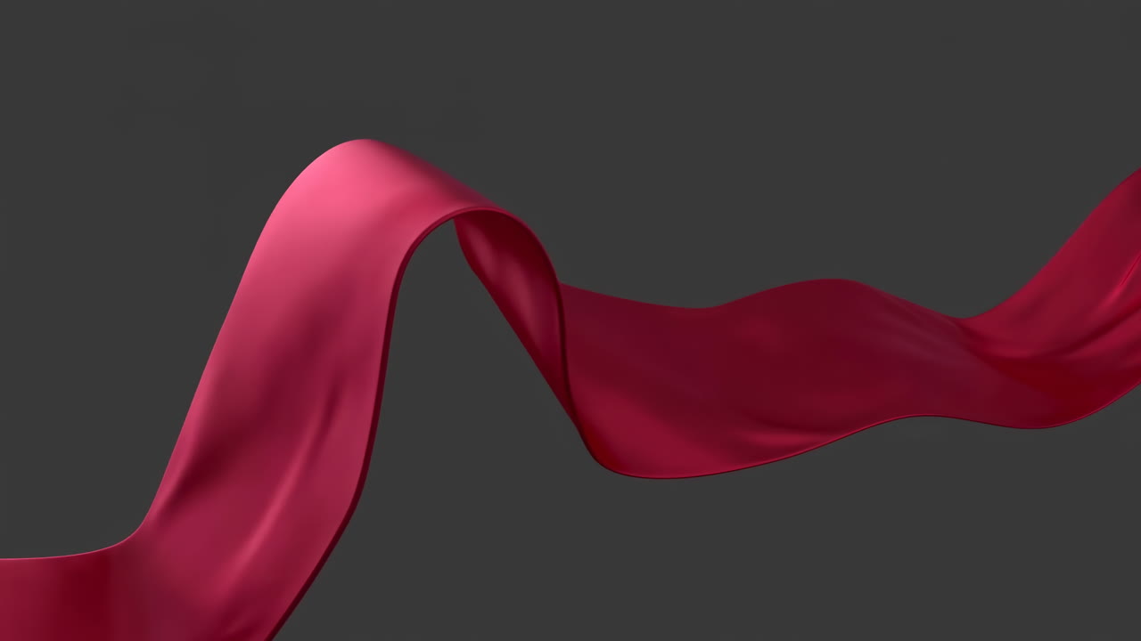 Nastro di seta rosso che scorre fluidamente su uno sfondo scuro