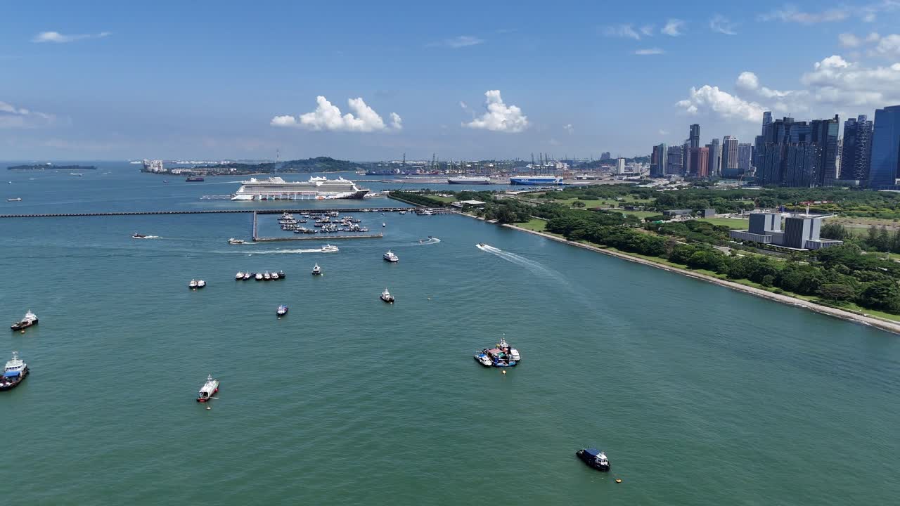 Drone aerial view of a fleet of cargo oil ships off the coast of singapore busy shipping lane global trade economy tankers