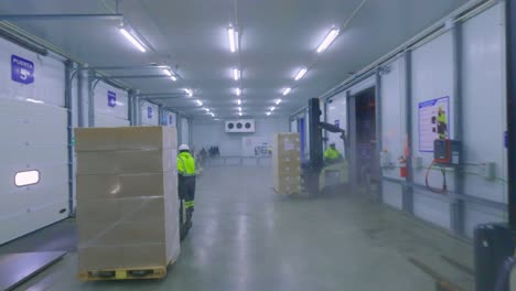 workers in frozen food warehouse