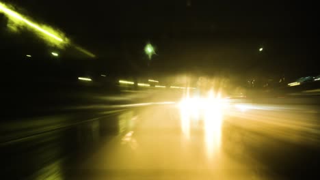 hyperlapse of a drive through los angeles on a rainy night - abstract