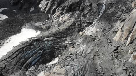 sobrevuelo aéreo sobre y lejos del glaciar tiefen en uri, suiza