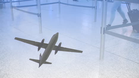 airplane flying against low section of passengers walking in the airport