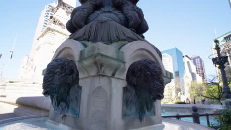 Water-trickling-from-Bison-Head-Bronze-Sculpture-at-Soldiers-and-Sailors-Monument-fountain,-Indianapolis,-Indiana,-USA