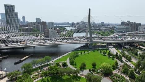 wide drone shot of the zakim bridge in downtown boston, massachusetts