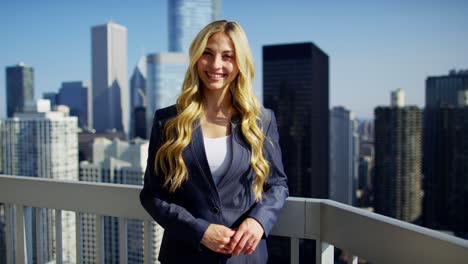 portrait of caucasian female businesswoman on city rooftop