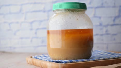 Homemade-ghee-in-container-on-a-table