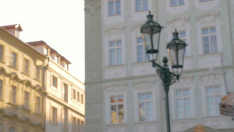 View-of-unfocused-cityscape-on-the-background-and-then-seen-ice-cream-balls-in-the-waffle-cup-Prague-Czech-Republic