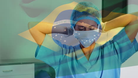 animación de la bandera de brasil ondeando sobre una doctora en el hospital