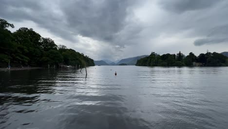 calm and tranquil scene of derwentwater water lake in early morning