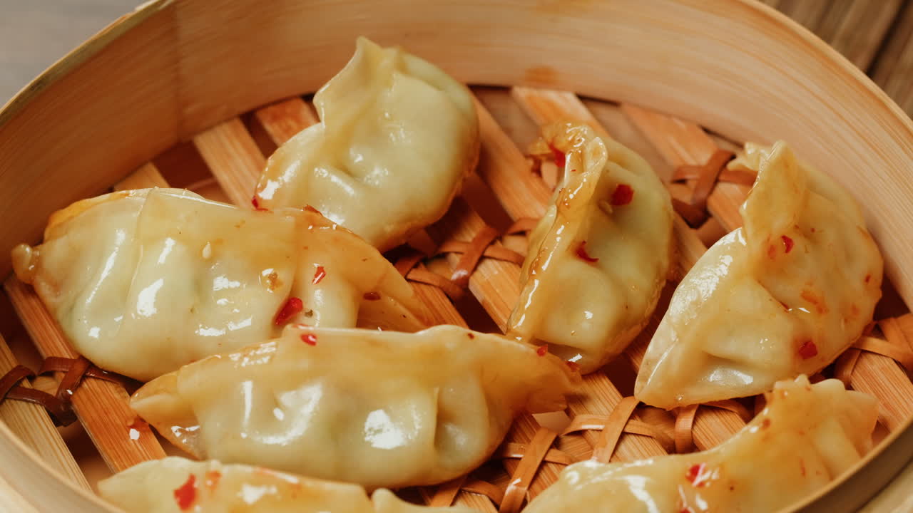 Delicious Gyoza Dumplings Steaming in a Bamboo Basket