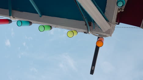 colorful hanging lamps on a building