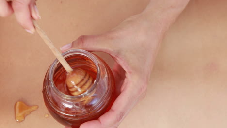 woman getting a honey massage