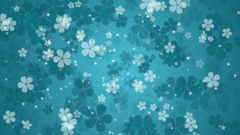delicate white flowers rotate and fly on green abstract background with blurred particles. spring holiday video. looped motion graphics.