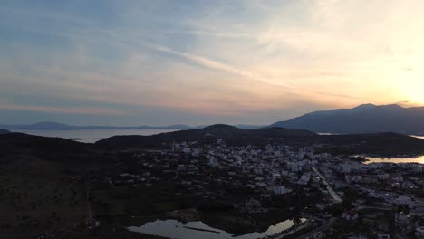 aerial view of coastal town at sunset