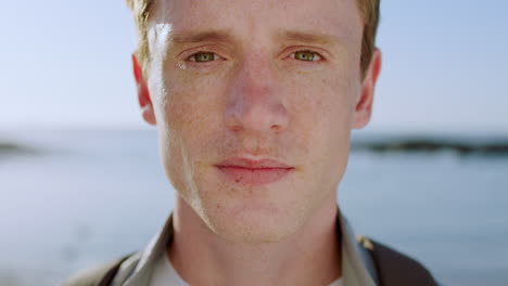 Face,-beach-and-man-with-freckles-in-summer