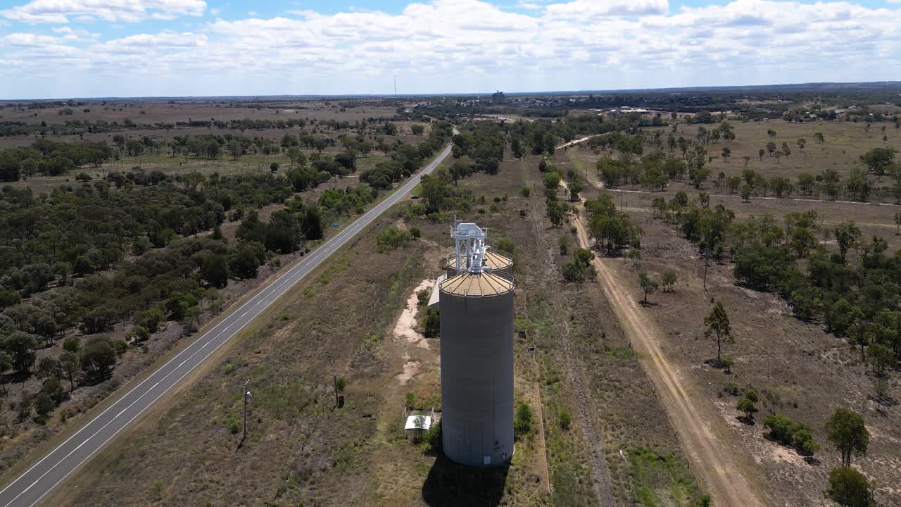 Aerial View of Rural Australian Landscape with Silos and Road