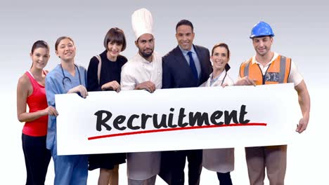 various professional holding placard of recruitment text