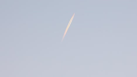 shot of military fighter trail under blue sky