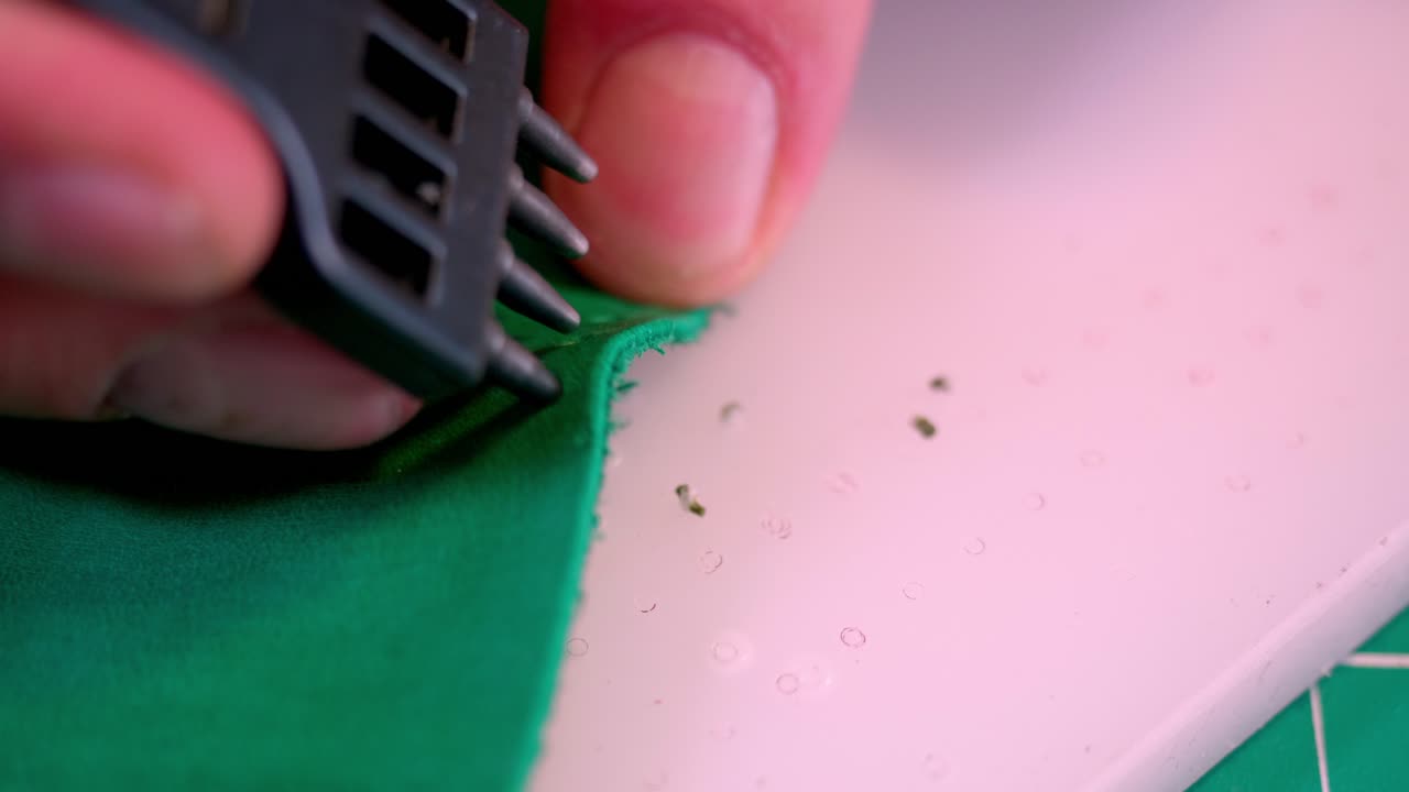 A tanner measures and cuts leather using various tools. The process includes careful handling to ensure accuracy. Each step is shown clearly from preparation to cutting