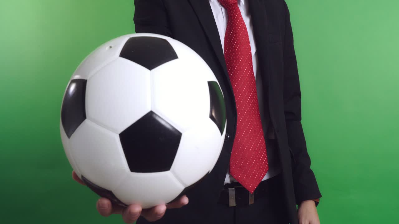 Businessman Holding A Soccer Ball, Video In 4K