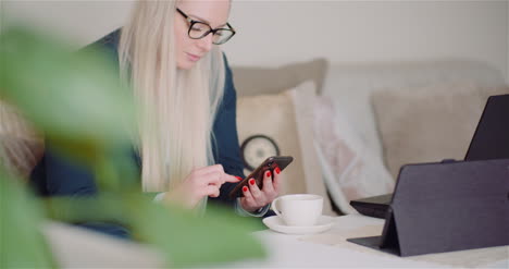 woman browsing social media on smartphone 2