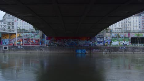 graffitis under a bridge in vienna