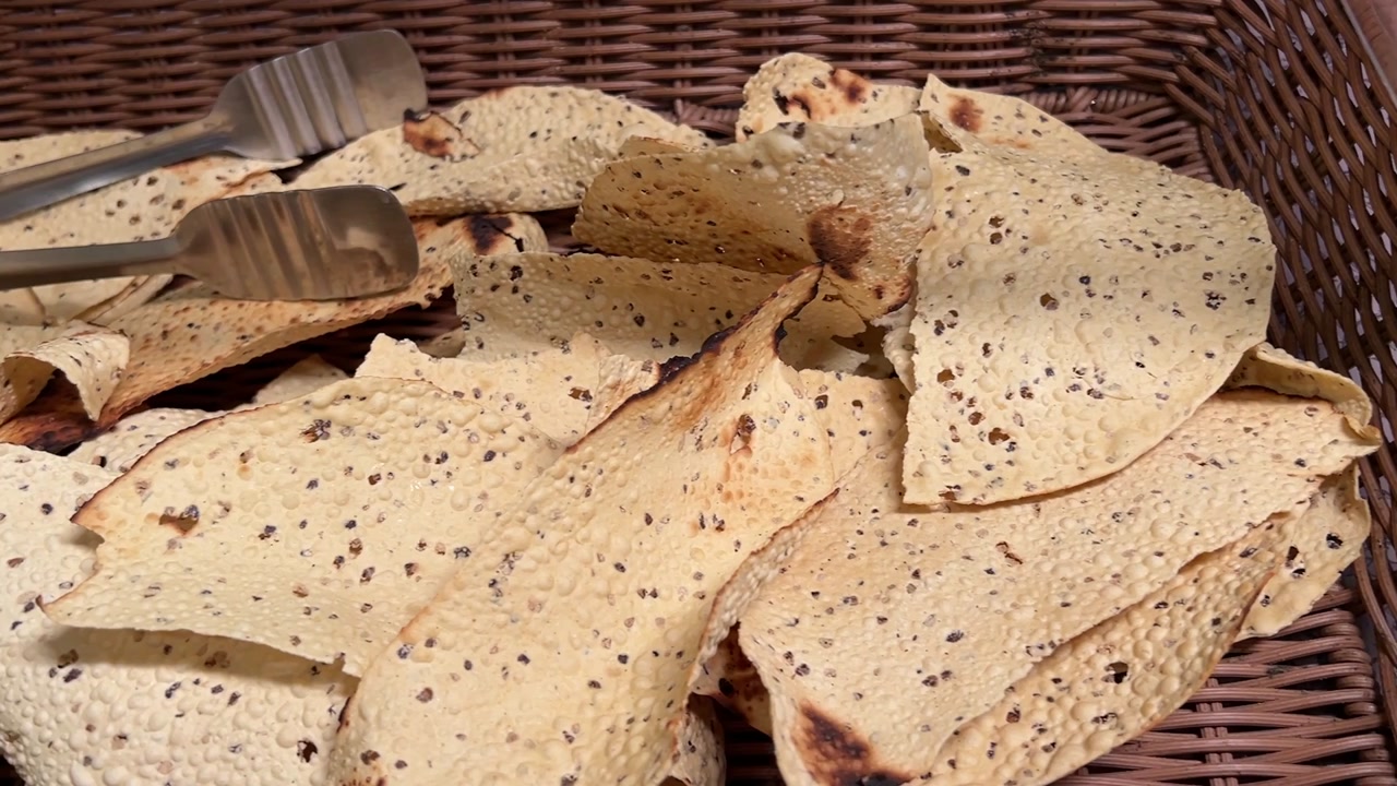 Fresh fried papad kept in bamboo basket in India