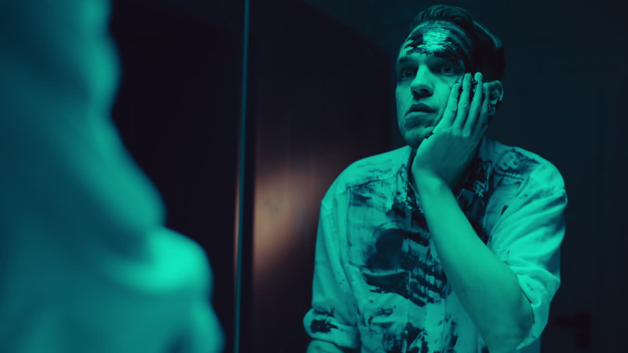 Man with Painted Face in a Mirror